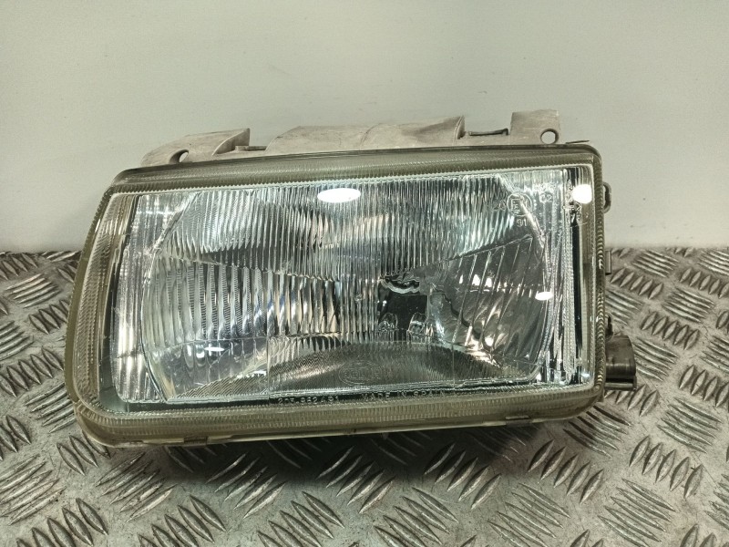 Recambio de faro izquierdo para volkswagen polo iii (6n1) 75 1.6 referencia OEM IAM 96249500  