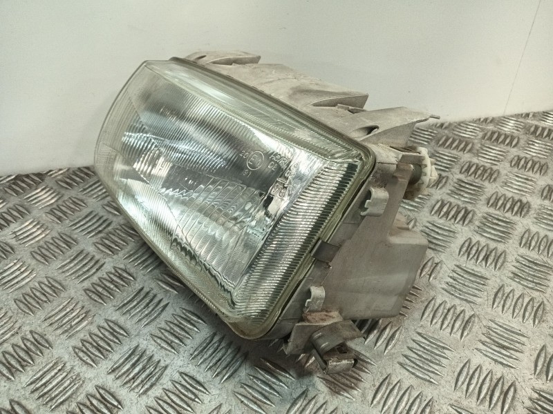 Recambio de faro izquierdo para volkswagen polo iii (6n1) 75 1.6 referencia OEM IAM 96249500  