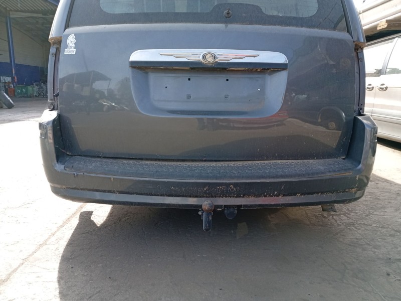 Recambio de paragolpes trasero para chrysler grand voyager v (rt) 2.8 crd referencia OEM IAM 68048158AE  
