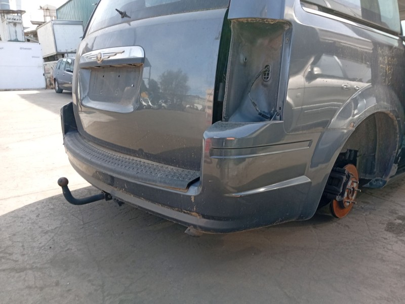 Recambio de paragolpes trasero para chrysler grand voyager v (rt) 2.8 crd referencia OEM IAM 68048158AE  