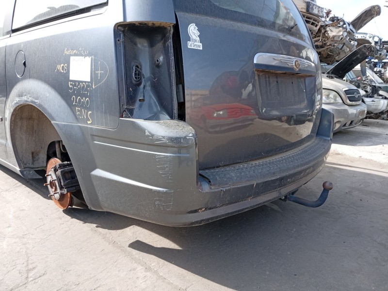 Recambio de paragolpes trasero para chrysler grand voyager v (rt) 2.8 crd referencia OEM IAM 68048158AE  