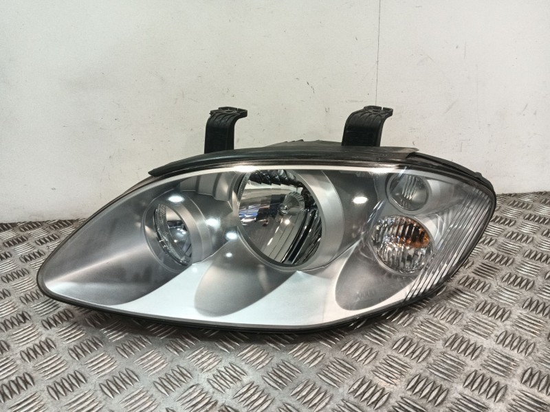 Recambio de faro izquierdo para ssangyong rodius i 2.7 xdi referencia OEM IAM 8310121305  