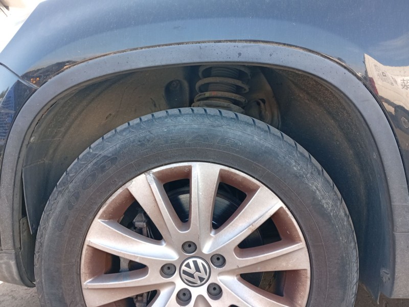 Recambio de paso de rueda delantero izquierdo para volkswagen tiguan (5n_) 1.4 tsi 4motion referencia OEM IAM 5N0805911A  