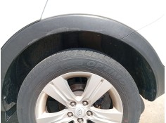 Recambio de paso de rueda trasero izquierdo para kia sportage iii (sl) 1.6 gdi referencia OEM IAM 868213U000  