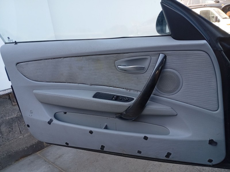 Recambio de guarnecido puerta delantera izquierda para bmw 1 (e81) 118 d referencia OEM IAM 51415975300  