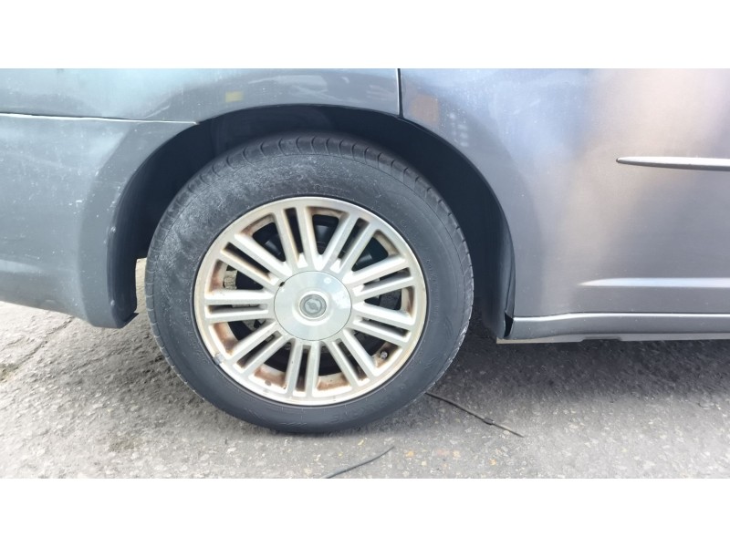 Recambio de paso de rueda trasero derecho para chrysler sebring (js) 2.0 crd referencia OEM IAM 04389828AF  
