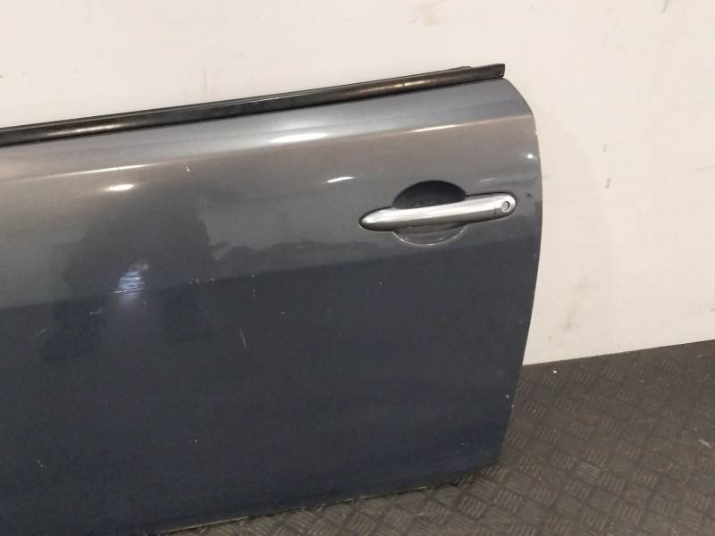 Recambio de puerta delantera izquierda para renault megane ii coupe/cabrio referencia OEM IAM 7751474924  