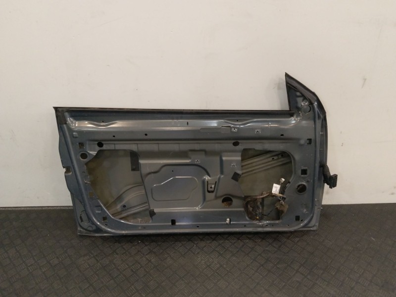 Recambio de puerta delantera izquierda para renault megane ii coupe/cabrio referencia OEM IAM 7751474924  